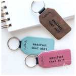 Manifes.... Key Ring (2 Colors Available)